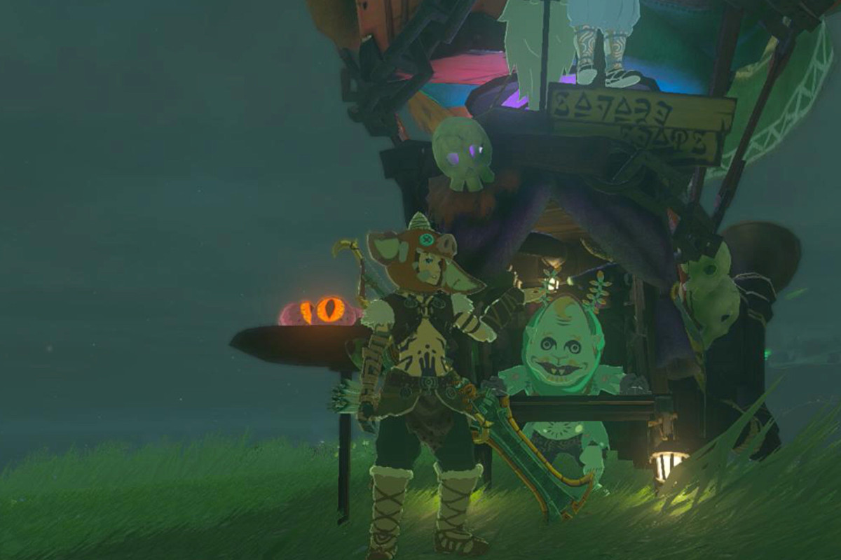 Link poses with a shopkeep named Koltin in The Legend of Zelda: Tears of the Kingdom