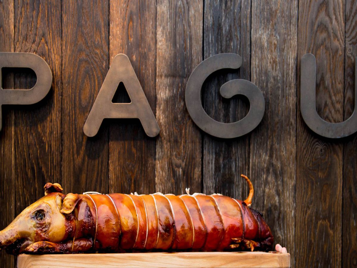 Pagu’s signage and a whole pig