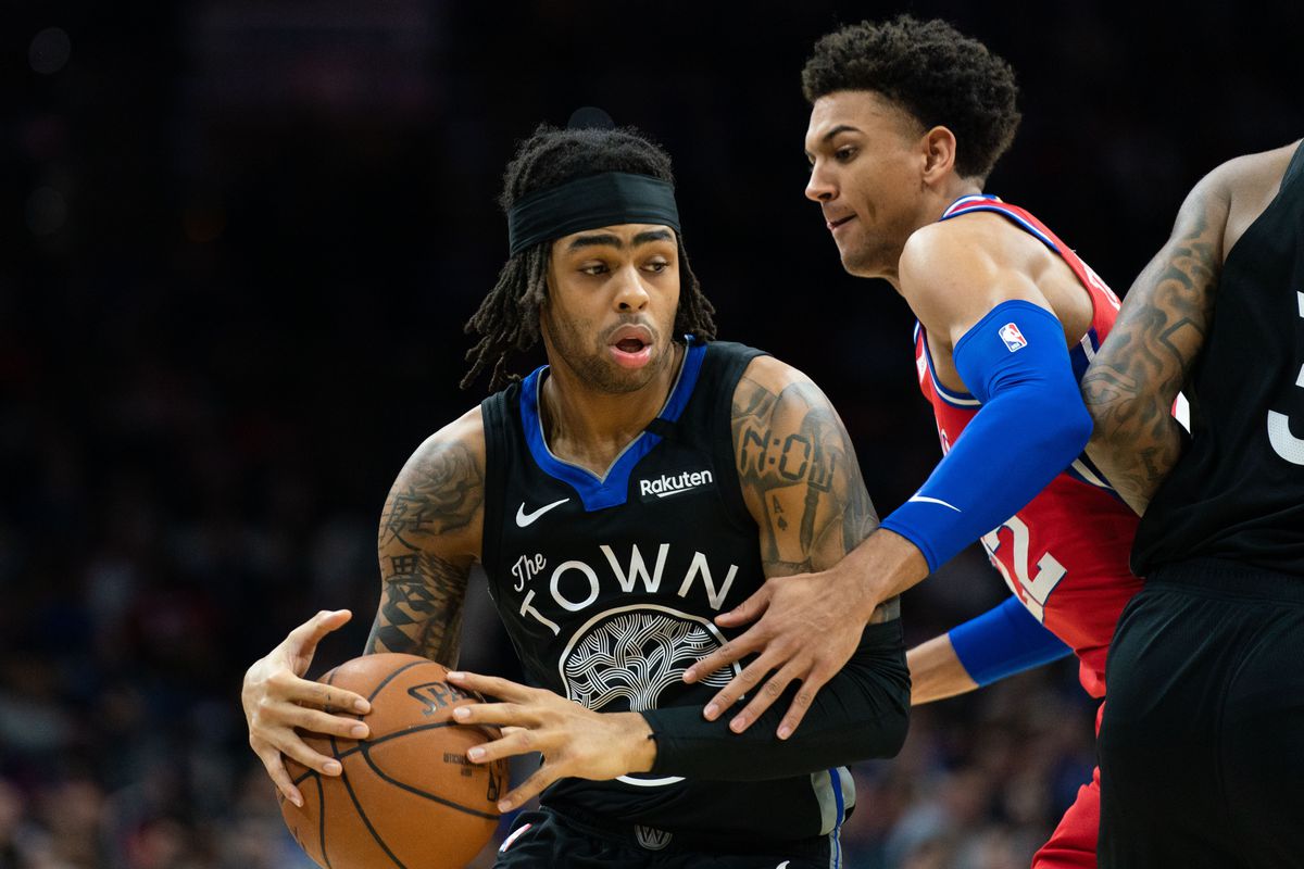 Golden State Warriors guard D’Angelo Russell drives against Philadelphia 76ers guard Matisse Thybulle during the second quarter at Wells Fargo Center.