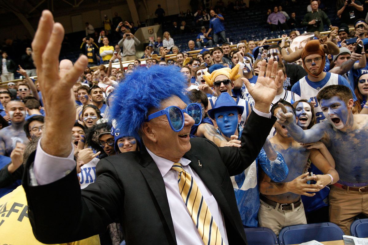 Dick Vitale mugging with the Cameron Crazies