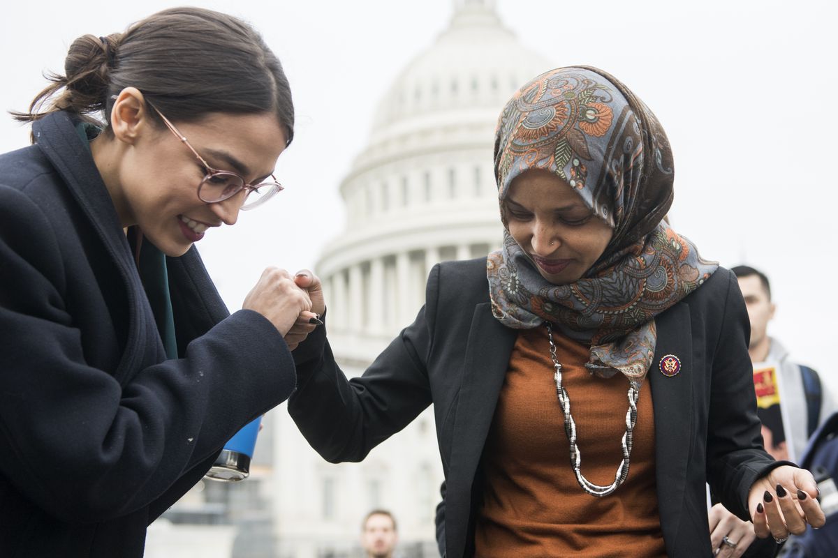 Reps. Alexandria Ocasio-Cortez and Ilhan Omar at an immigration rally on Capitol Hill.