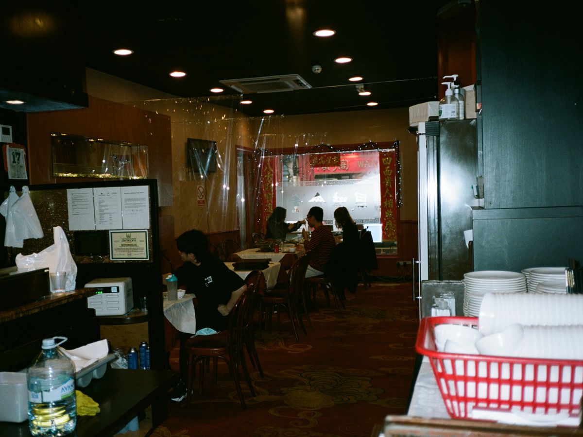 A darkened restaurant interior. 