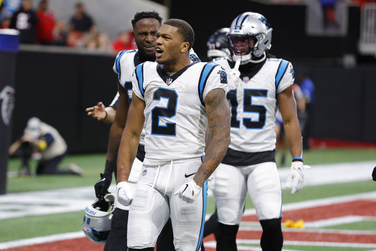 DJ Moore #2 of the Carolina Panthers reacts after removing his helmet following a touchdown late in the fourth quarter against the Atlanta Falcons at Mercedes-Benz Stadium on October 30, 2022 in Atlanta, Georgia.