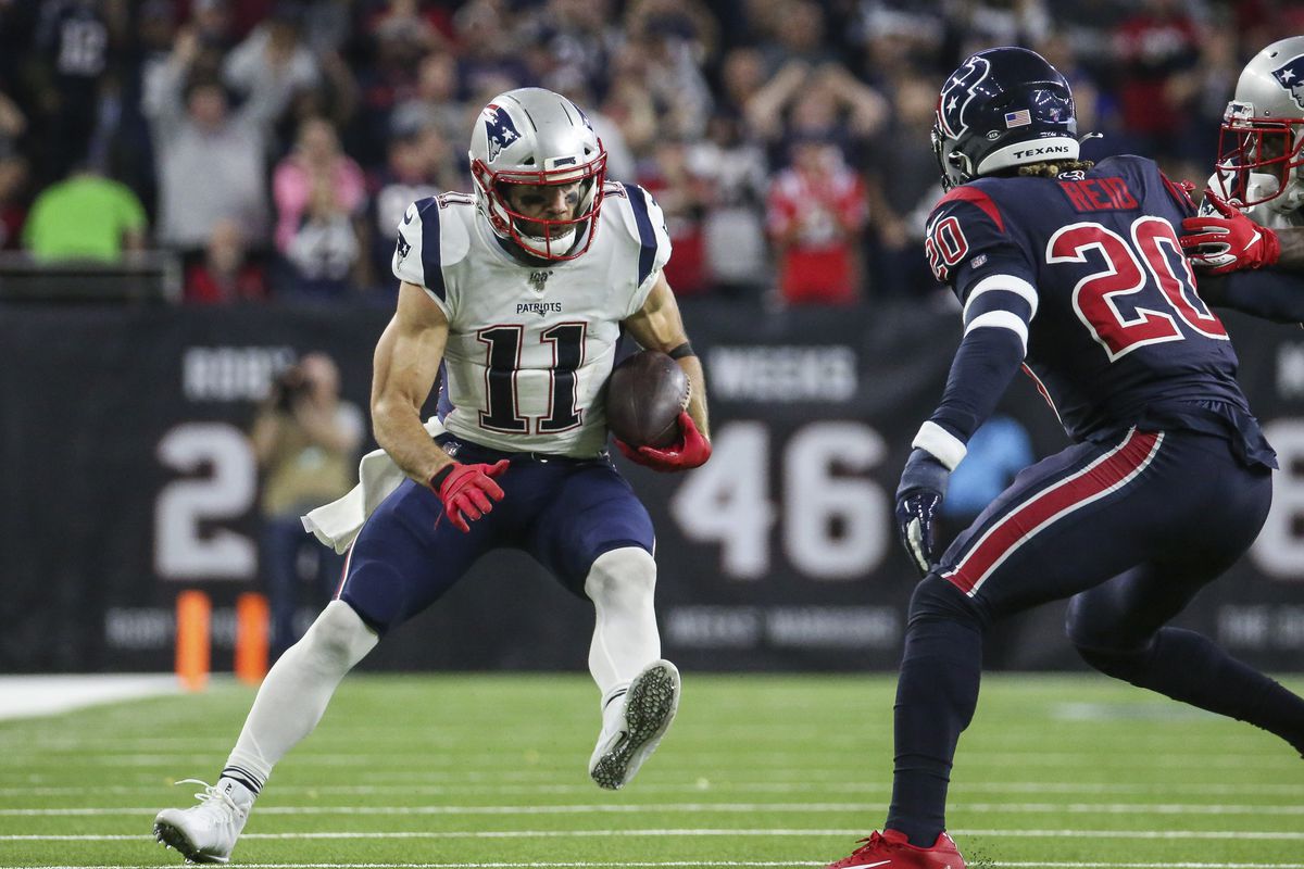 New England Patriots wide receiver Julian Edelman runs with the ball after a reception during the third quarter against the Houston Texans at NRG Stadium.
