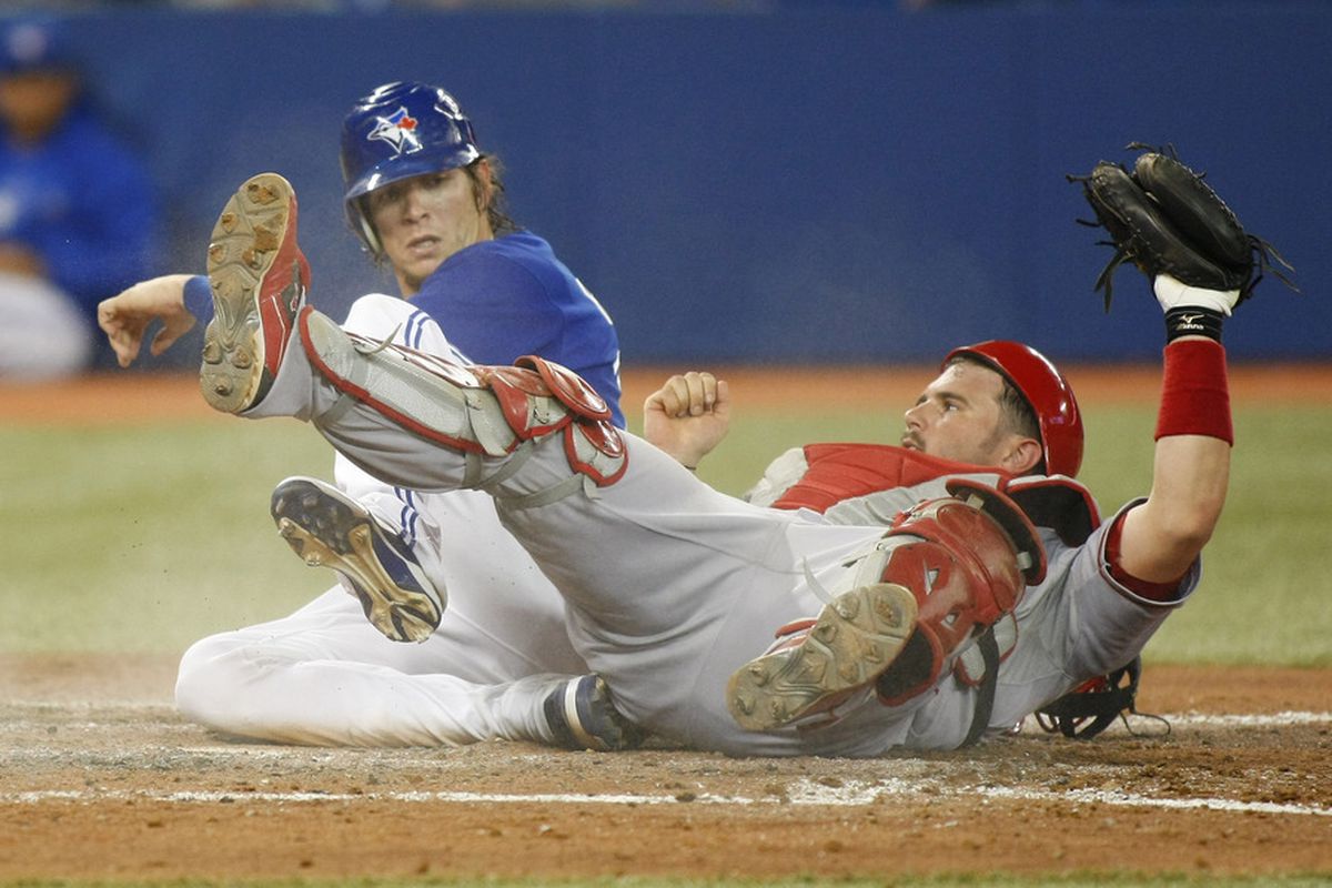 Colby Rasmus tenderizes Bobby Wilson with his foot.