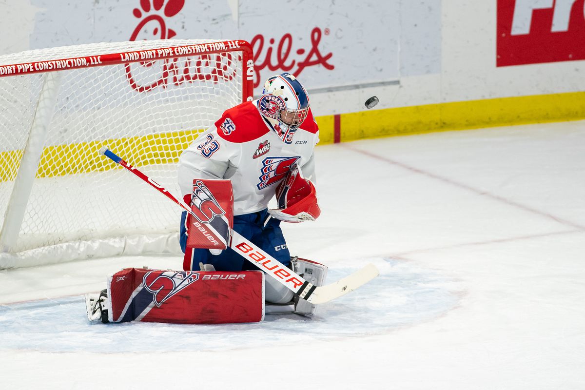 Spokane Chiefs goaltender Lukas Parik #33 makes a chest save during the first period of a game between the Everett Silvertips and Spokane Chiefs at Angel of the Winds Arena on November 27, 2019 in Everett, Washington.