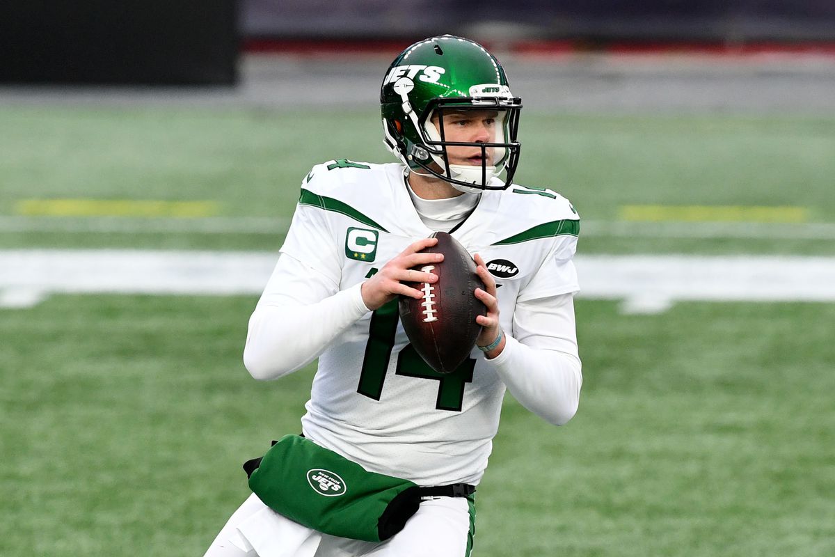 New York Jets quarterback Sam Darnold looks to pass against the New England Patriots during the second quarter at Gillette Stadium.