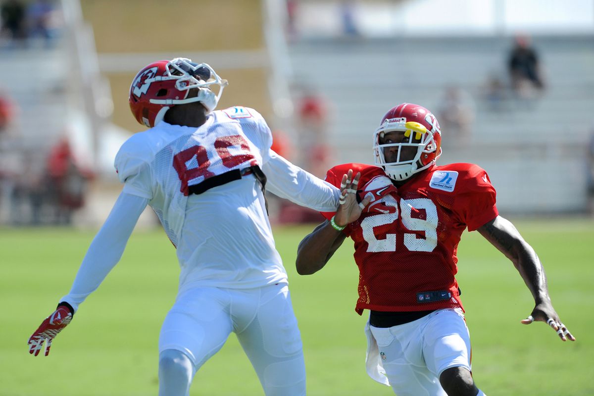 July 29, 2012; St. Joseph, MO, USA; Kansas City Chiefs wide receiver Jon Baldwin (89) and defensive back Eric Berry (29) fight for a pass during training camp at Missouri Western State University. Mandatory Credit: Denny Medley-US PRESSWIRE