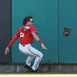 Ute outfielder Dashawn Keirsey, Jr. reacts after crashing into the wall in center field, severely injuring himself as Utah and Arizona State play at Smith's Ballpark in Salt Lake City on Sunday, May 28, 2017.