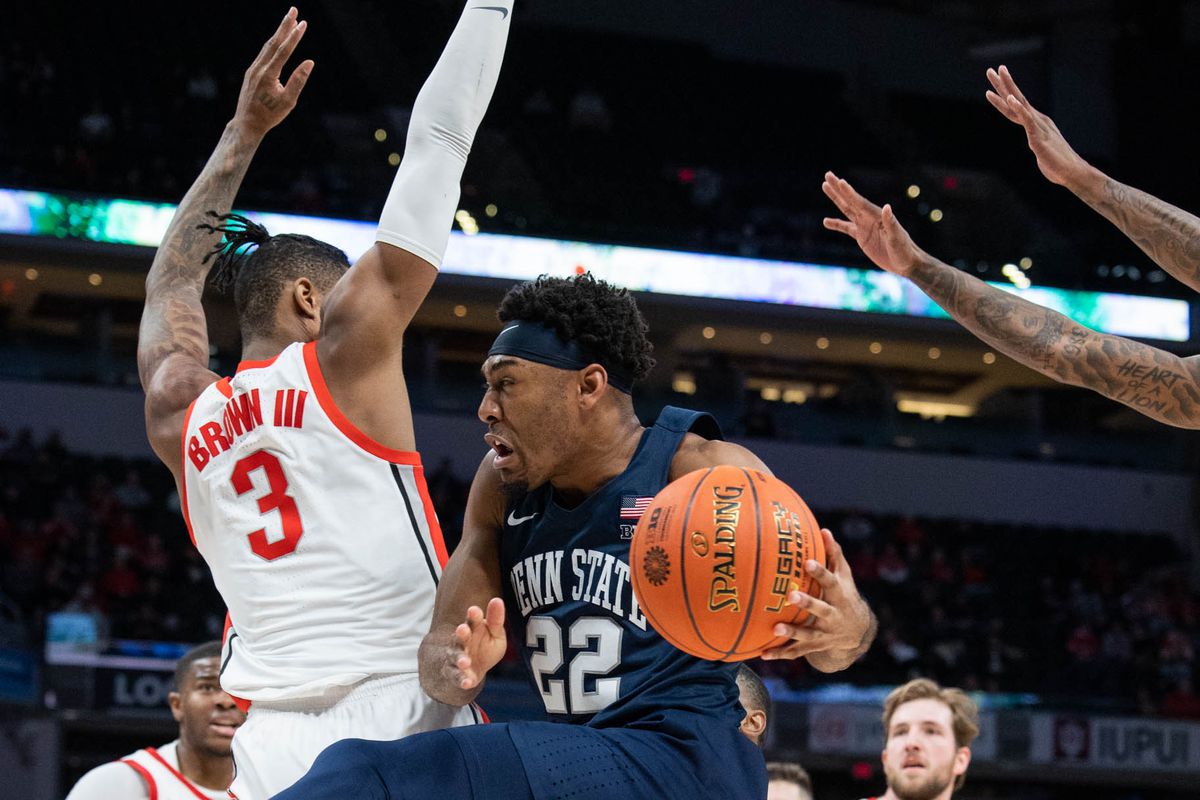 Mar 10, 2022; Indianapolis, IN, USA; Penn State Nittany Lions guard Jalen Pickett (22) passes the ball while Ohio State Buckeyes guard Eugene Brown III (3) defends in the second half at Gainbridge Fieldhouse.