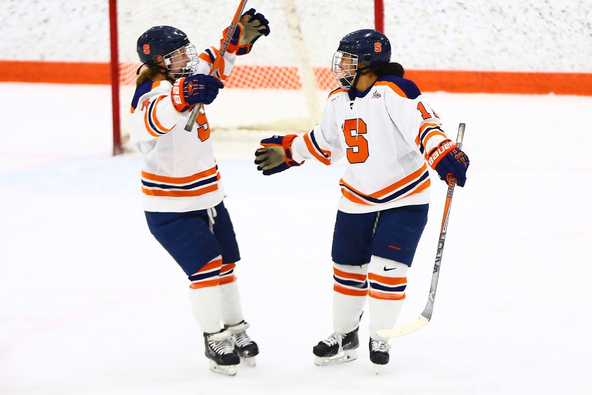 Jessica Sibley (left) and Emily Costales celebrate after a goal against the University of North Dakota.