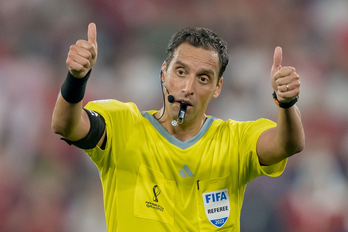 Referee Fernando Rapallini reacts during the FIFA World Cup Qatar 2022 Group G match between Serbia and Switzerland at Stadium 974 on December 02, 2022 in Doha, Qatar.