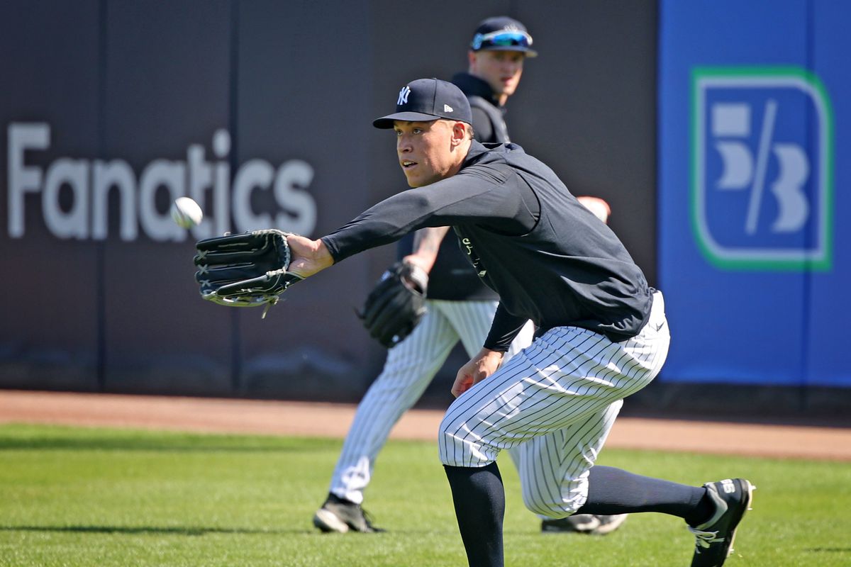 New York Yankees team captain Aaron Judge practices during spring training workout in Tampa