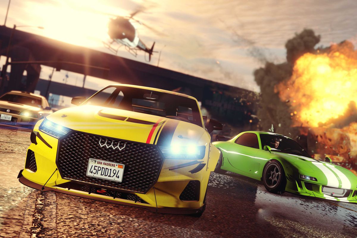 Three cars, one helicopter, and one explosion in a screenshot from Grand Theft Auto Online