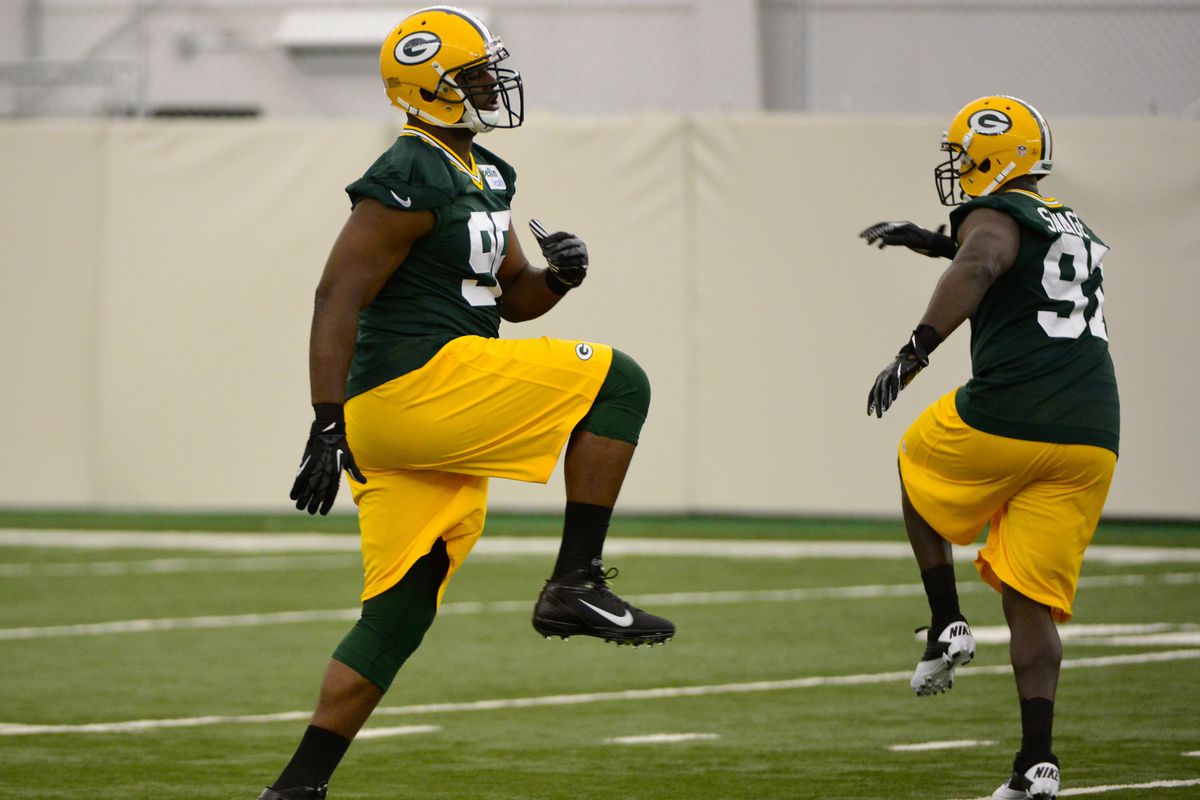 As will likely be the case all season, Donte Savage (right) works out in Datone Jones' shadow.