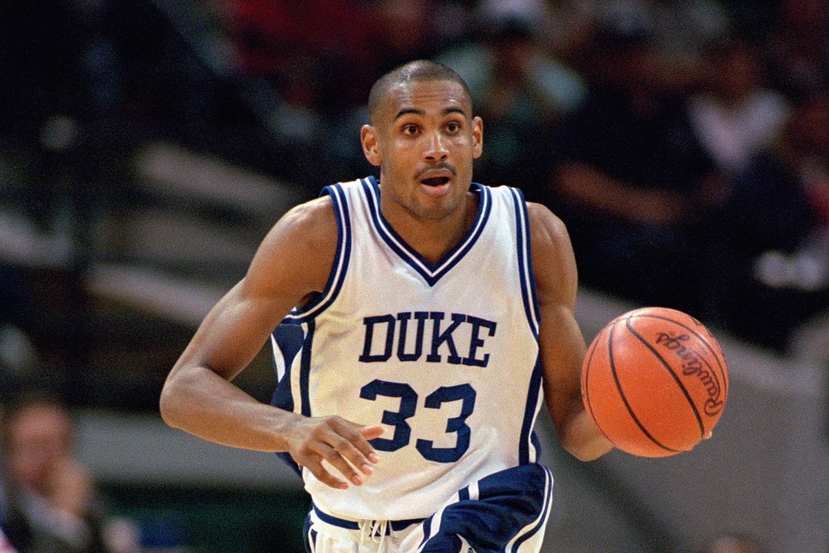 Grant Hill drives the ball downcourt