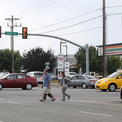 People cross the street at the intersection of 3500 South and Redwood Road in West Valley City, one of the 10 intersections with the most auto-pedestrian accidents in Salt Lake County and Utah County, based on data from 2010-2016, on Tuesday, Aug. 8, 2017.