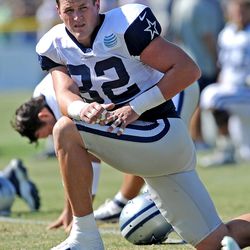 Dallas Cowboys tight end Jason Witten (82) stretches during training camp. 