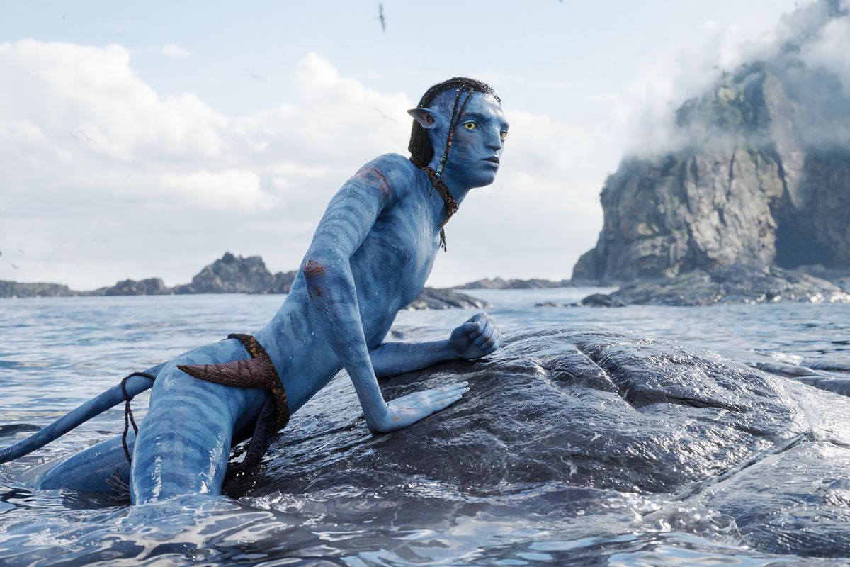 a lanky teenage blue-skinned na’vi on the back of a space whale in avatar: the way of water