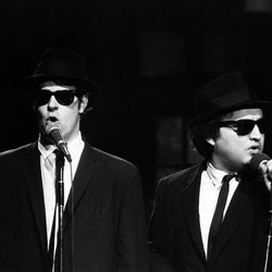 This Nov. 18, 1978 photo released by NBC shows Dan Aykroyd as Elwood Blues, left, and John Belushi as Jake Blues, performing as the Blues Brothers on "Saturday Night Live," in New York. The long-running sketch comedy series will celebrate their 40th anniversary with a 3-hour special airing Sunday at 8 p.m. EST on NBC. 
