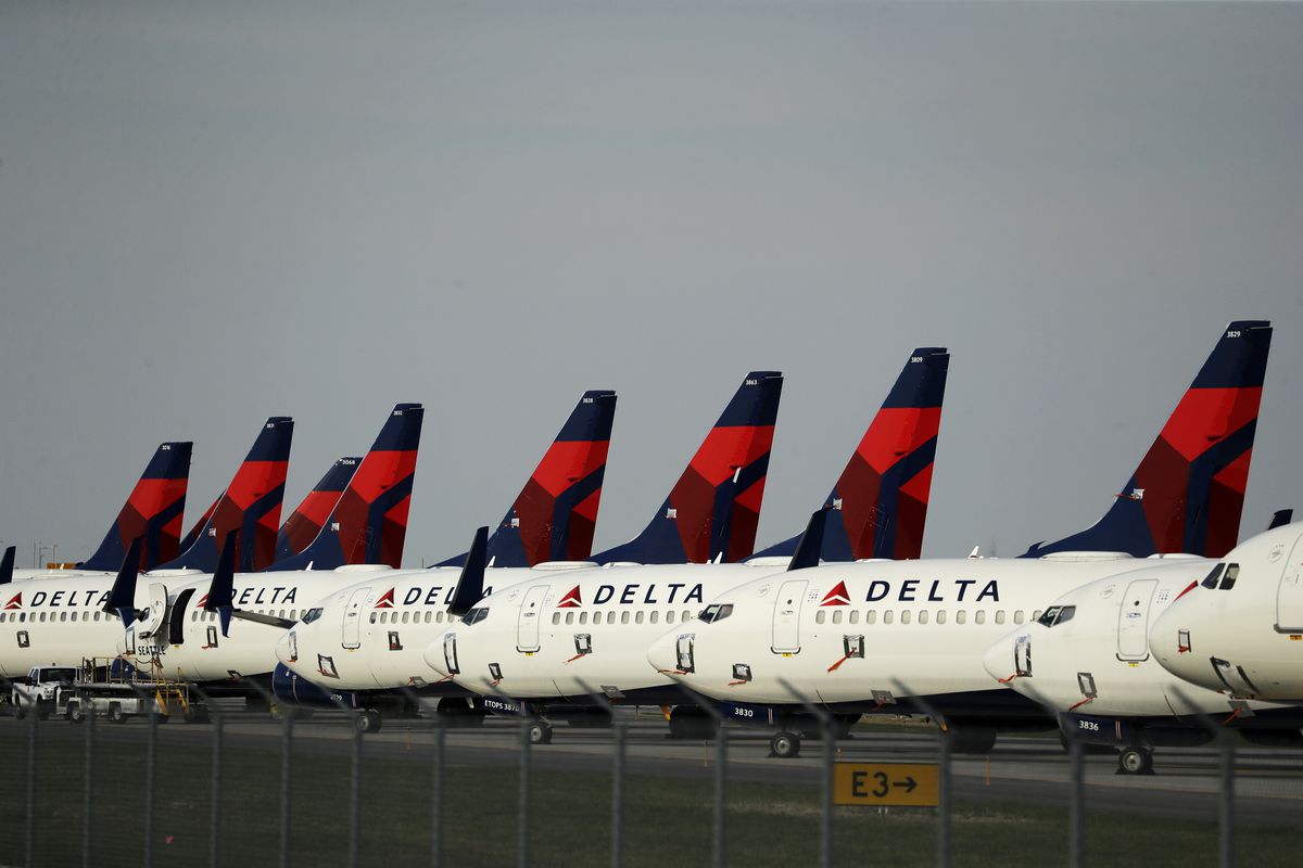Several dozen mothballed Delta Air Lines jets are parked at Kansas City International Airport in Kansas City, Mo., on April 1, 2020.