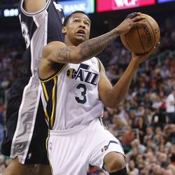 Utah Jazz's point guard Trey Burke (3) drives to the basket as the Utah Jazz and the San Antonio Spurs play Saturday, Dec. 14, 2013 at EnergySolutions Arena in Salt Lake City. The Spurs won 100-84.