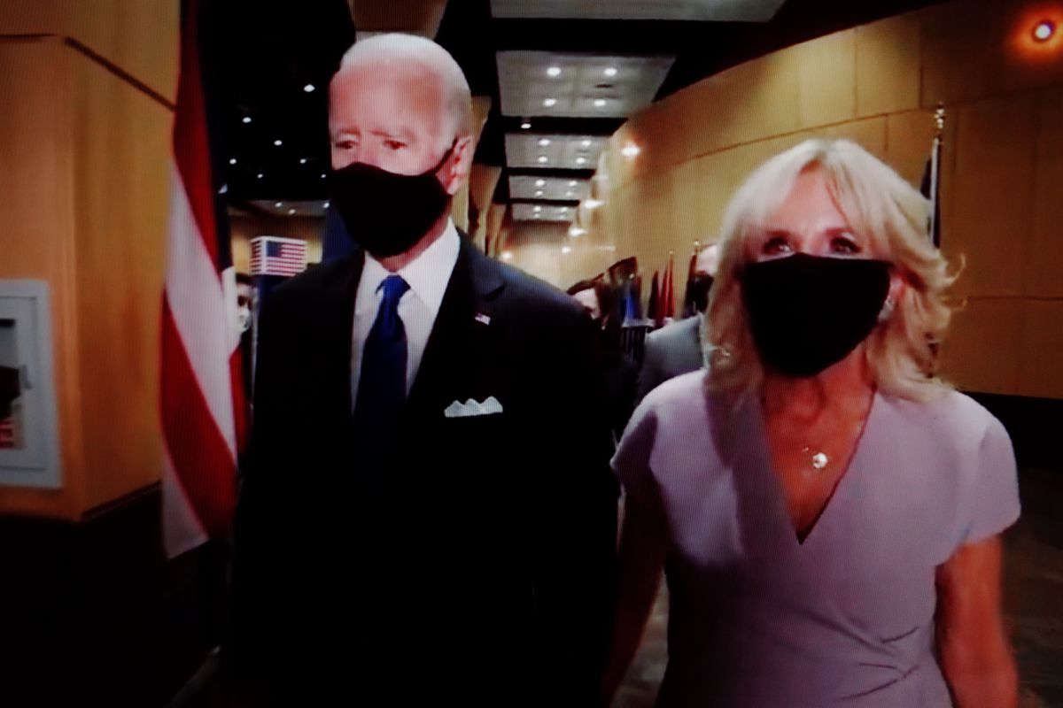 &nbsp;Presidential nominee and former US Vice President Joe Biden and wife Jill Biden wear face masks backstage during the closing moments of the virtual 2020 Democratic National Convention, livestreamed online and viewed by laptop from the United Kingdom in the early hours of August 21, 2020.