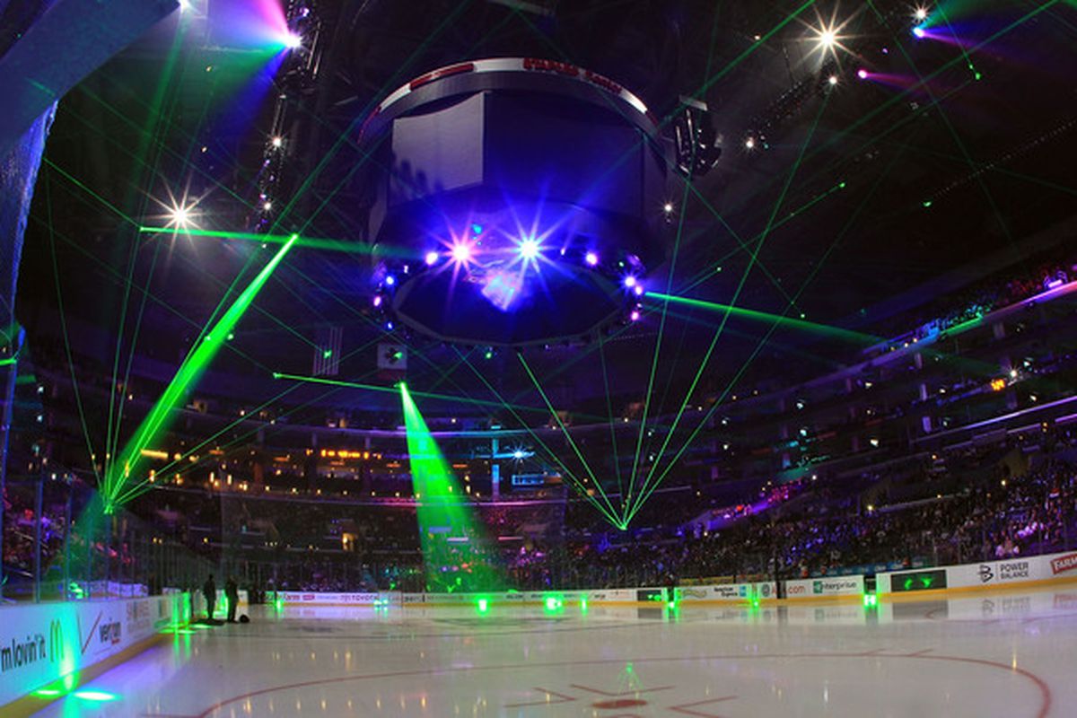 LOS ANGELES CA - JANUARY 10:  The Staples Center is bathed in laser light prior to the game between the Toronto Maple Leafs and the Los Angeles Kings on January 10 2011 in Los Angeles California.  (Photo by Bruce Bennett/Getty Images)