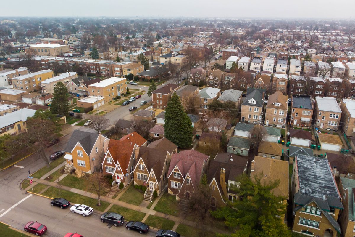 Aerial photo from suburban Berwyn looking towards cloud covered Chicago in March.