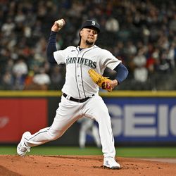  Luis Castillo #58 of the Seattle Mariners throws a pitch during the first inning against the St. Louis Cardinals at T-Mobile Park on April 22, 2023 in Seattle, Washington.