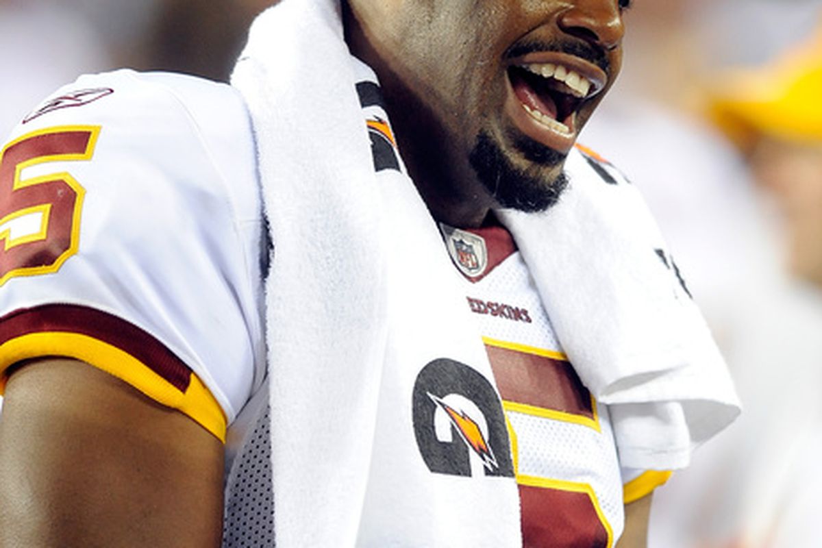 LANDOVER MD - AUGUST 13:  Donovan McNabb #5 of the Washington Redskins talks to teammates during the preseason game against the Buffalo Bills at FedEx Field on August 13 2010 in Landover Maryland.  (Photo by Greg Fiume/Getty Images)