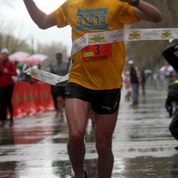 Bryant Jensen wins the Salt Lake City Marathon with a time of 2:30:14 at Liberty Park in Salt Lake City on Saturday, April 20, 2013.