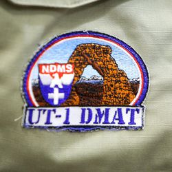 A patch worn by member of Utah's Disaster Medical Assistance Team is pictured the Salt lake City International Airport on Tuesday, Aug. 29, 2017. The team's 36 members are headed to Texas to aid in Hurricane Harvey relief efforts. The team consists of physicians, nurses, paramedics, emergency medical technicians and other medical specialists.