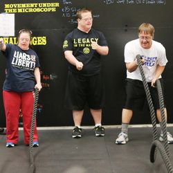 James Fitzgerald, center, teaches a class at Gold's Gym in Ogden on Monday, Dec. 5, 2016. Fitzgerald, who has Down syndrome, teaches a fitness class with his brother, Evan, specifically for people with disabilities.