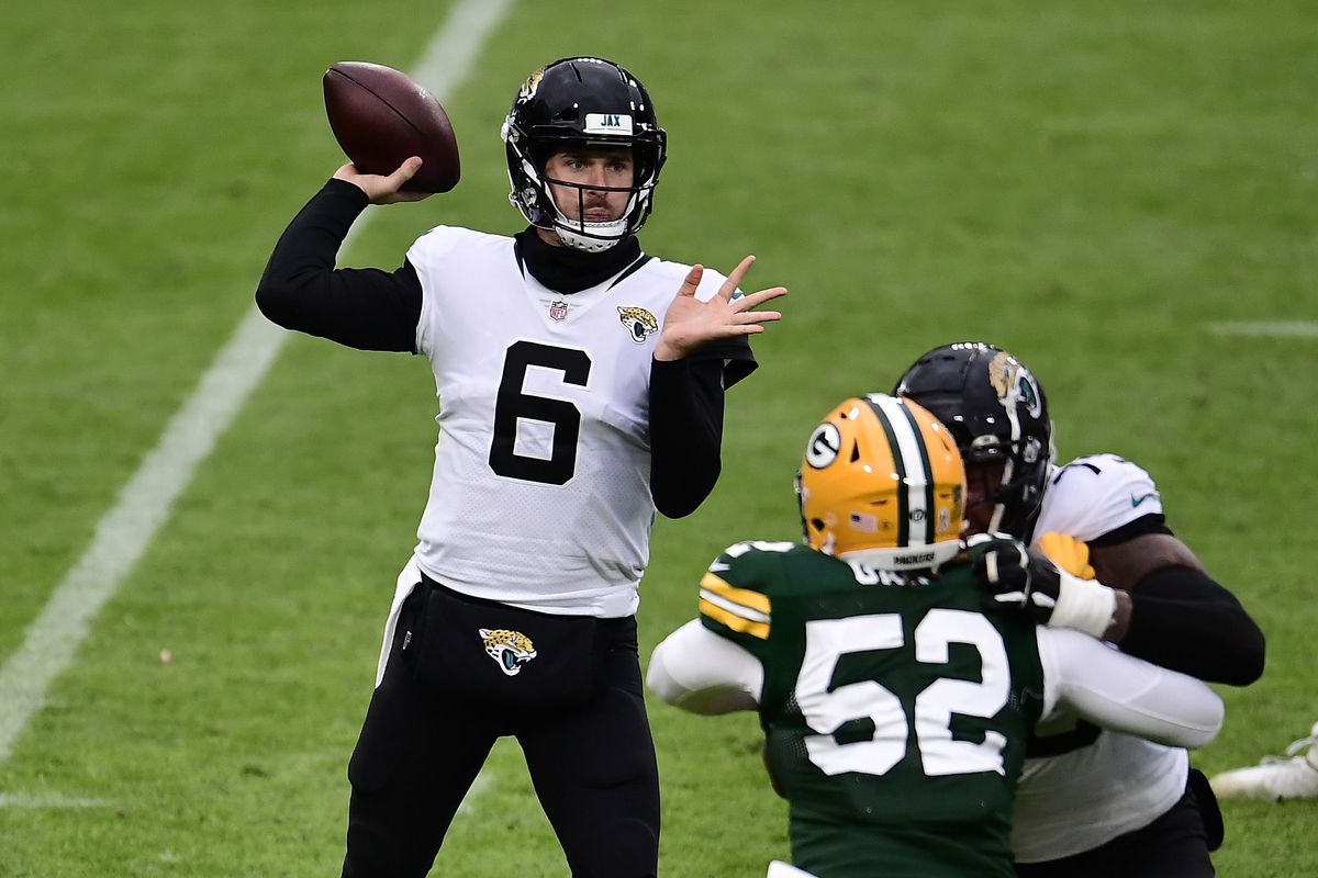 Jake Luton #6 of the Jacksonville Jaguars drops back to pass during a game against the Green Bay Packers at Lambeau Field on November 15, 2020 in Green Bay, Wisconsin. The Packers defeated the Jaguars 24-20.