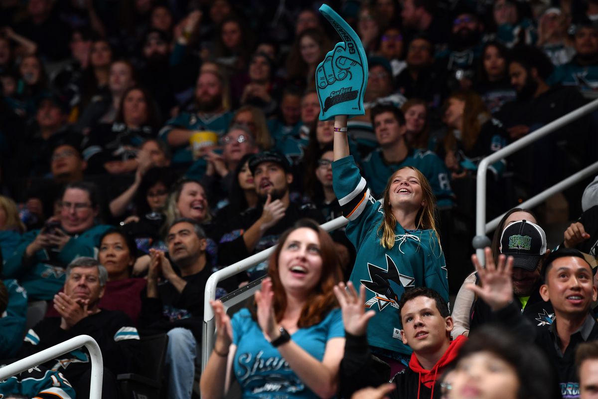 A fan cheers as the San Jose Sharks play against the Buffalo Sabres at SAP Center on October 19, 2019 in San Jose, California.
