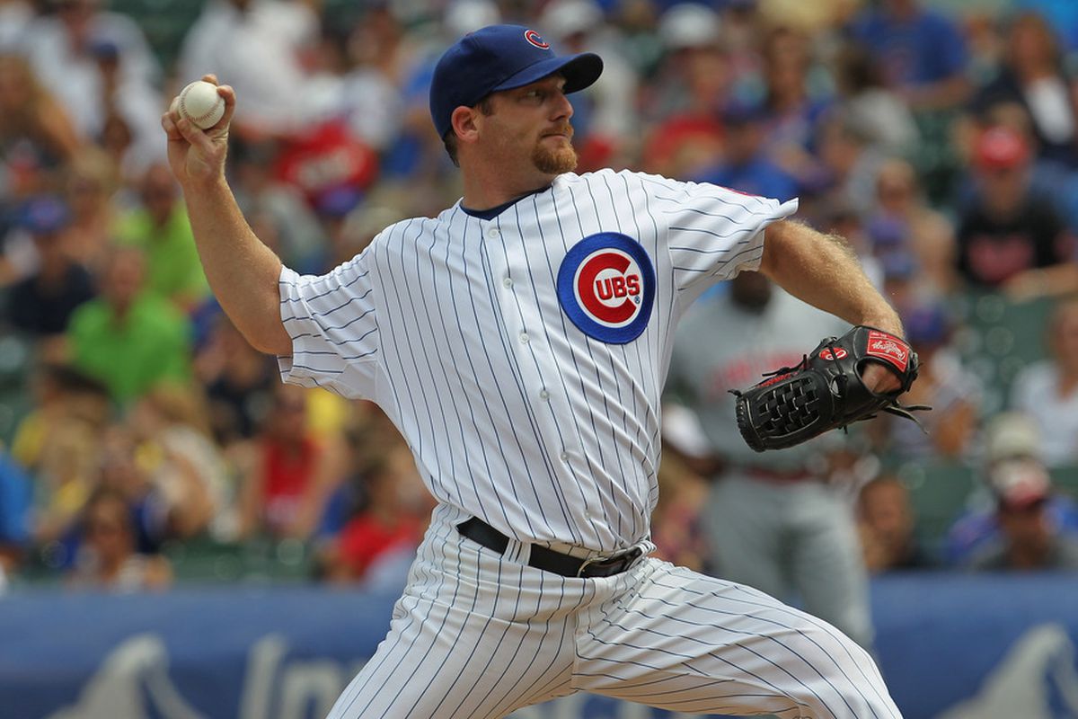 Starting pitcher Ryan Dempster of the Chicago Cubs delivers the ball against the Cincinnati Reds at Wrigley Field in Chicago, Illinois. (Photo by Jonathan Daniel/Getty Images)