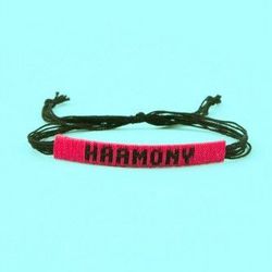 <a href="http://www.openingceremony.us/products.asp?menuid=2&designerid=1742&productid=80455">Harmony Friendship Bracelet</a>, $20.00