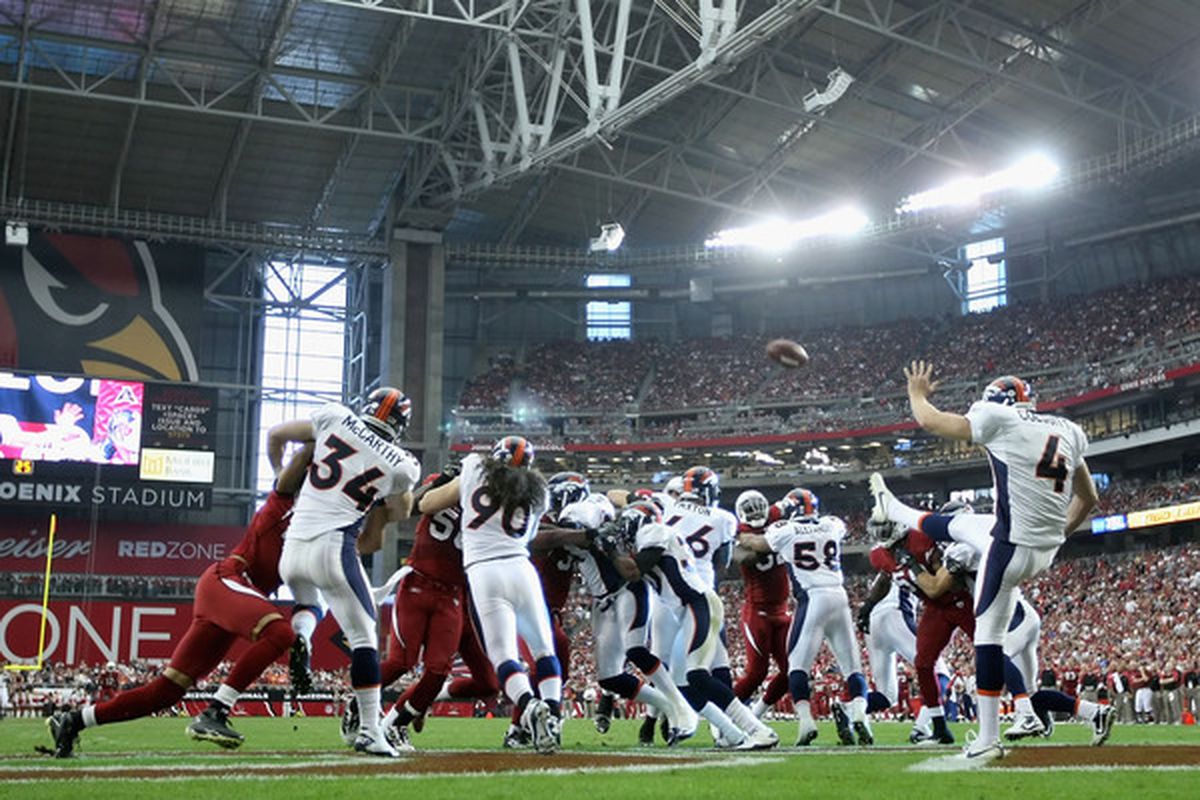 Punter Britton Colquitt of the Denver Broncos kicks the ball during the NFL game against the Arizona Cardinals at the University of Phoenix Stadium on December 12 2010. (Photo by Christian Petersen/Getty Images)