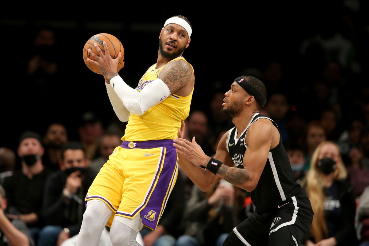 Los Angeles Lakers forward Carmelo Anthony (7) controls the ball against Brooklyn Nets forward Bruce Brown (1) during the fourth quarter at Barclays Center.