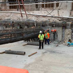 Workers reinforce a pipe inserted under the Salt Lake Temple with steel in Salt Lake City, Utah, in December 2021. The reinforced pipes will be filled with structural concrete to act as support beams beneath the existing temple foundation.