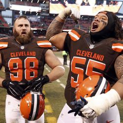 Cleveland Browns nose tackle Danny Shelton (55) and Jamie Meder (98) celebrate after a win over San Diego Chargers in an NFL football game, Saturday, Dec. 24, 2016, in Cleveland. 