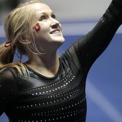 Utah's Kyndal Robarts performs on the floor during the NCAA Salt Lake Regional Gymnastics Saturday, April 7, 2012 in Salt Lake City. Robarts tied for first place in the exercise. 