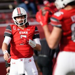 Utah quarterback Cameron Rising (7) throws the ball during warm-up ahead of an NCAA football game against Colorado at Rice-Eccles Stadium in Salt Lake City on Friday, Nov. 26, 2021.