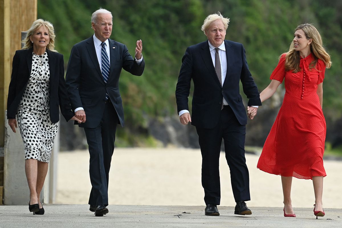 Britain’s Prime Minister Boris Johnson  and his wife Carrie Johnson walk with US President Joe Biden and US First Lady Jill Biden prior to a bi-lateral meeting at Carbis Bay, Cornwall on June 10, 2021, ahead of the three-day G7 summit being held from 11-13 June. 