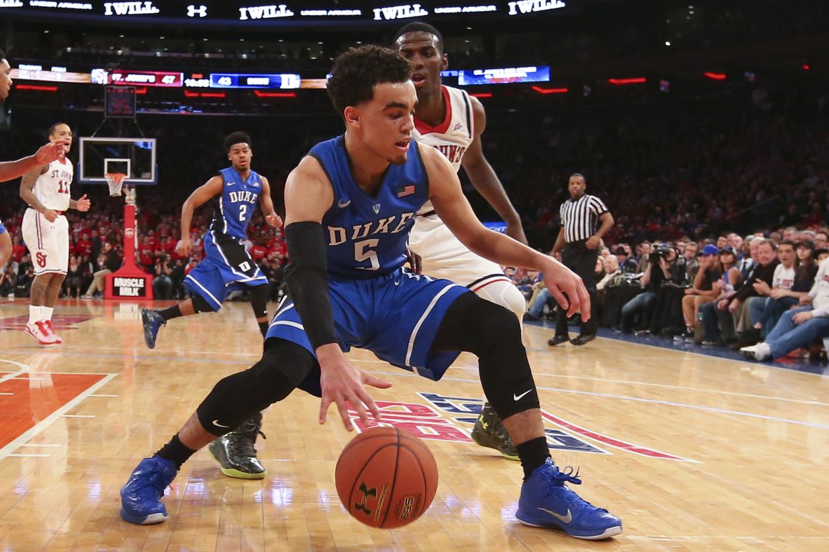 Jan 25, 2015; New York, NY, USA; Duke Blue Devils guard Tyus Jones (5) saves an outbound ball during the second half against the St. John's Red Storm at Madison Square Garden.