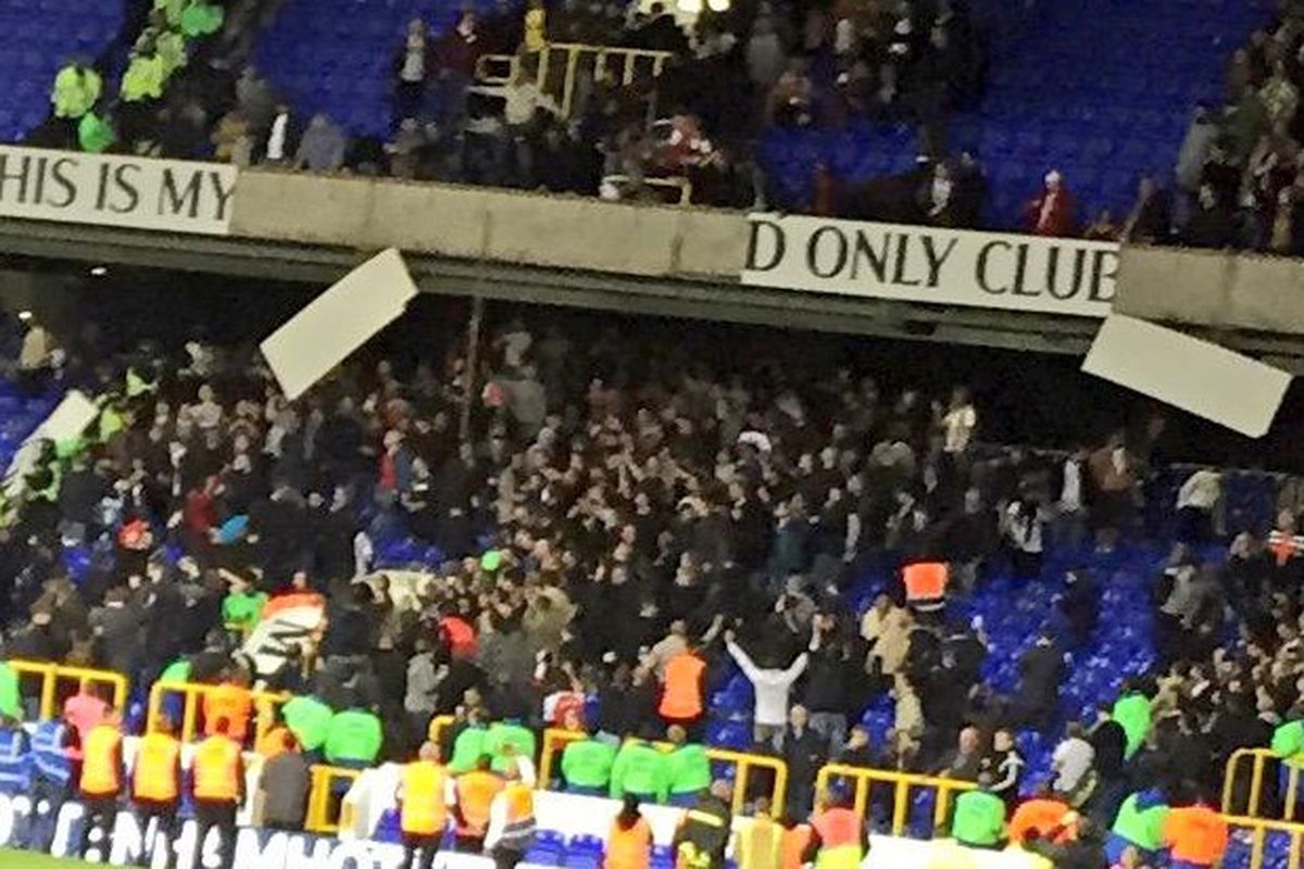 Arsenal fans destroying WHL signage after their win