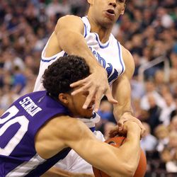 Weber State Wildcats guard Jeremy Senglin (30) falls into Brigham Young Cougars guard Jordan Chatman (25) during a basketball game at the Vivint Smart Home Arena in Salt Lake City on Saturday, Dec. 5, 2015. BYU won 73-68.