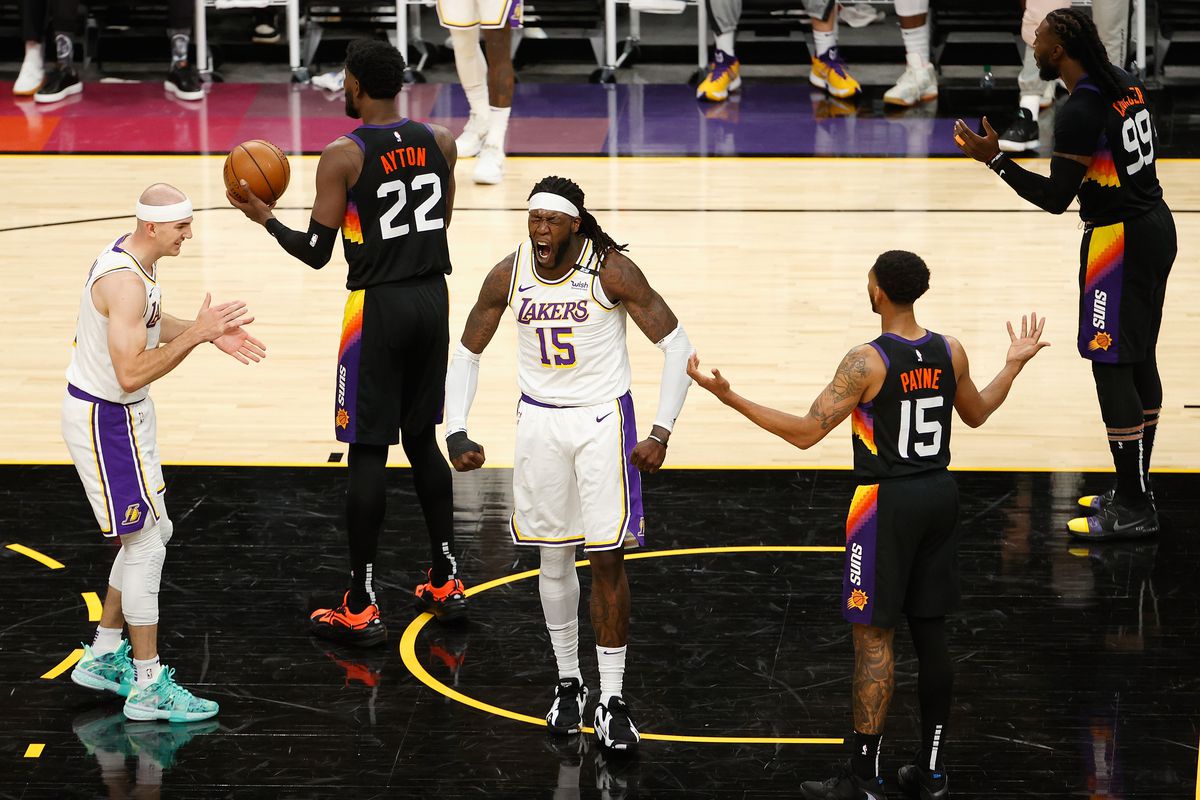 Montrezl Harrell of the Los Angeles Lakers reacts after drawing a foul to the Phoenix Suns during the first half of Game One of the Western Conference first-round playoff series at Phoenix Suns Arena on May 23, 2021 in Phoenix, Arizona.