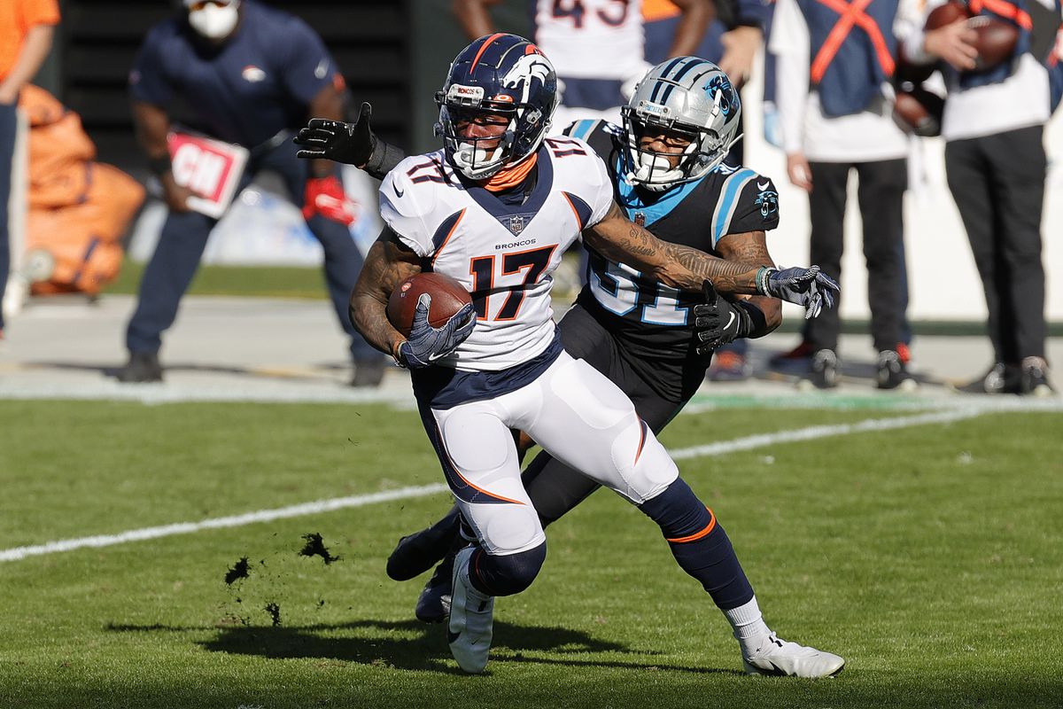 DaeSean Hamilton #17 of the Denver Broncos carries the ball against Juston Burris #31 of the Carolina Panthers during the second quarter at Bank of America Stadium on December 13, 2020 in Charlotte, North Carolina.